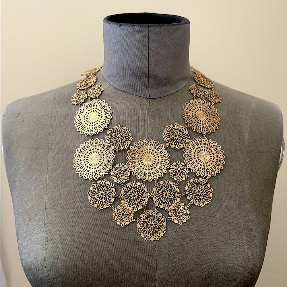 BCBGMaxAzria Gold flower/sunburst Necklace